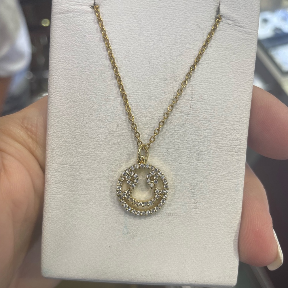 Smiley face gold